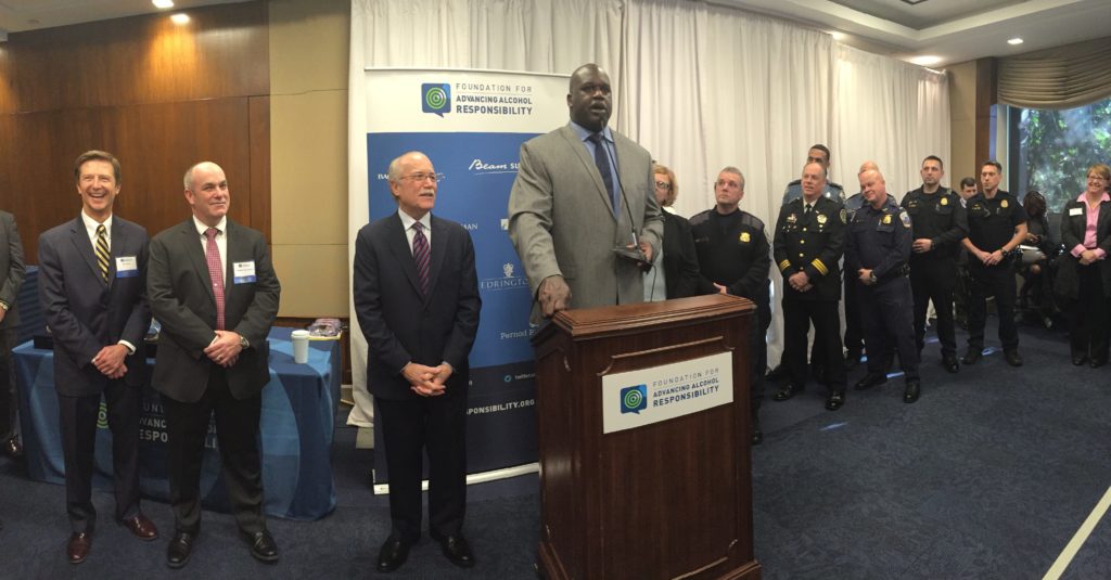 Shaq speaking with cops holiday hill event